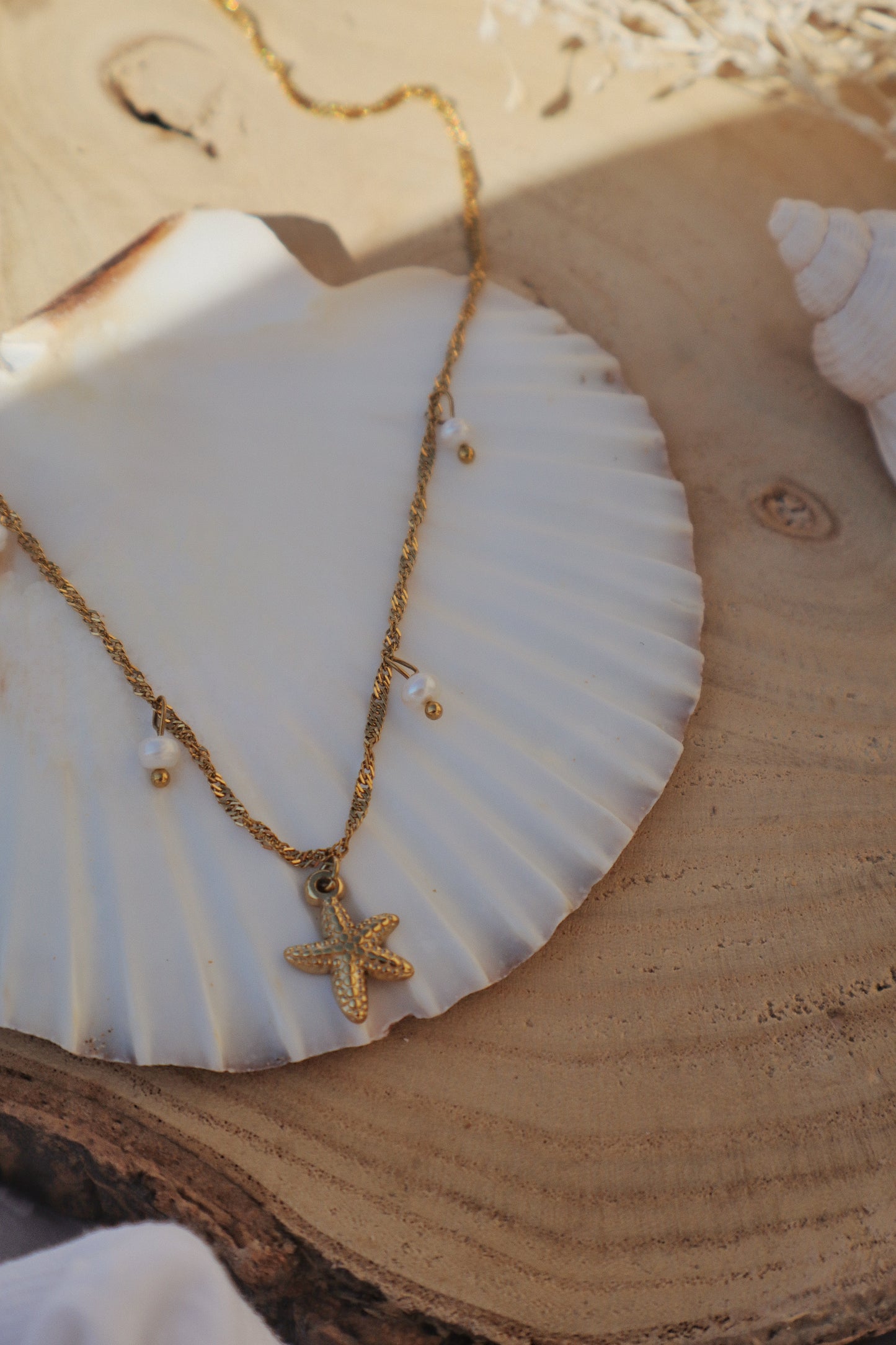 collier étoile de mer dorée