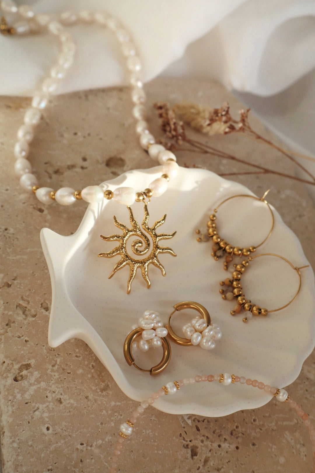 fait main bijoux créateur inspiration mer coquillage et soleil doré